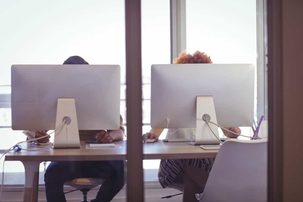 Office workers in front of their computers