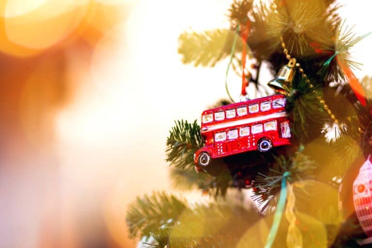 Holiday tree decorated with a miniature double-decker bus in the concept of 'how to use Enfield's public transport'.